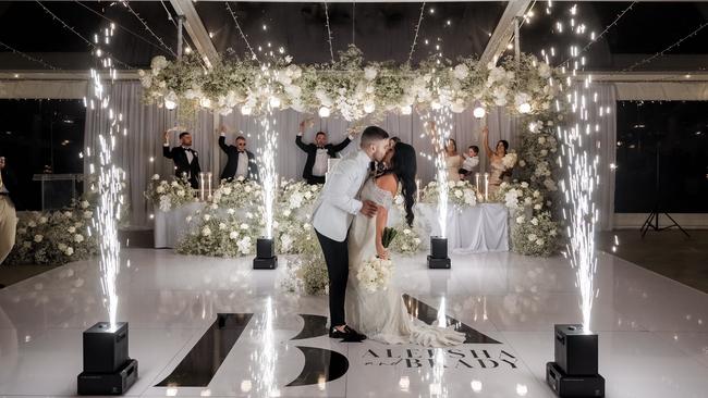 Dazzling pyrotechnics were the backdrop for Aleesha and Brady’s special moment. Picture: B Captured/Ky Luu