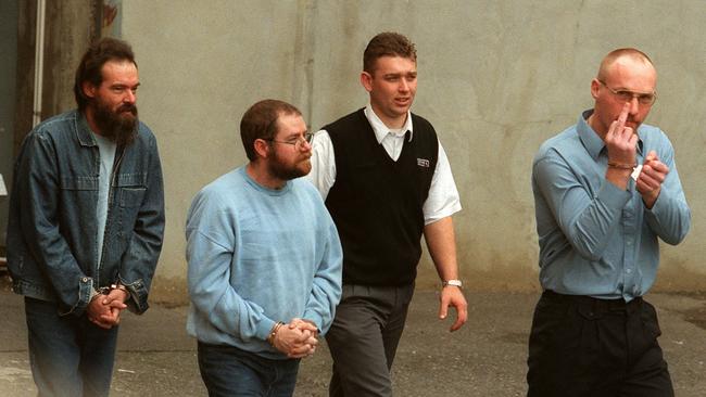 Mark Ray Haydon, Bunting and Robert Joe Wagner in police custody.