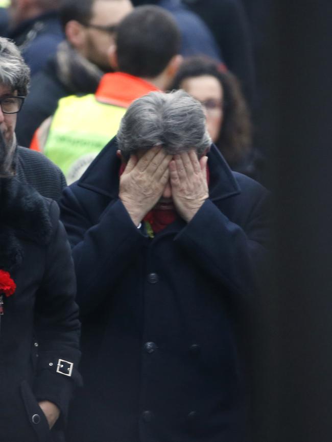 French far-left leader Jean-Luc Melenchon reacts outside of the headquarters of Charlie Hebdo. Picture: Kenzo Tribouillard