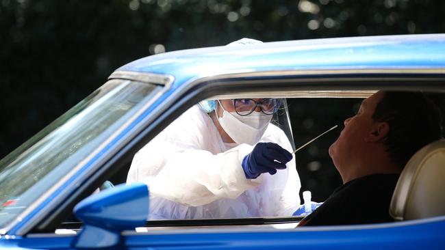 SYDNEY, AUSTRALIA - NewsWire Photos, SEPTEMBER, 20 2021: Nurses are seen conducting Covid-19 Tests at the Killara Drive Through testing Clinic in Sydney. Picture: NCA NewsWire / Gaye Gerard