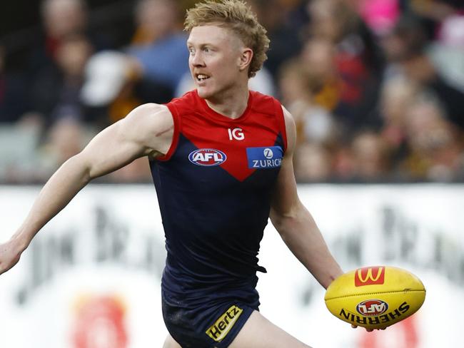 MELBOURNE, AUSTRALIA - AUGUST 20: Clayton Oliver of the Demons runs with the ball during the round 23 AFL match between Melbourne Demons and Hawthorn Hawks at Melbourne Cricket Ground, on August 20, 2023, in Melbourne, Australia. (Photo by Darrian Traynor/Getty Images)