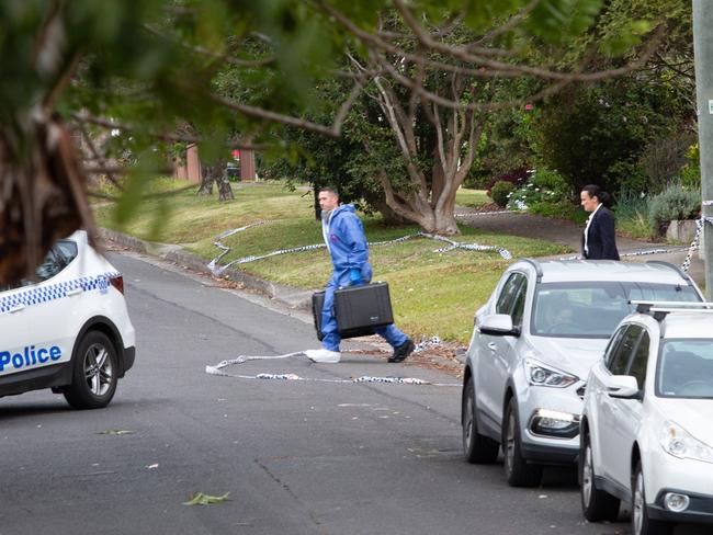 Forensics officers at the West Pennant Hills home, which was the scene of a tragic shooting.