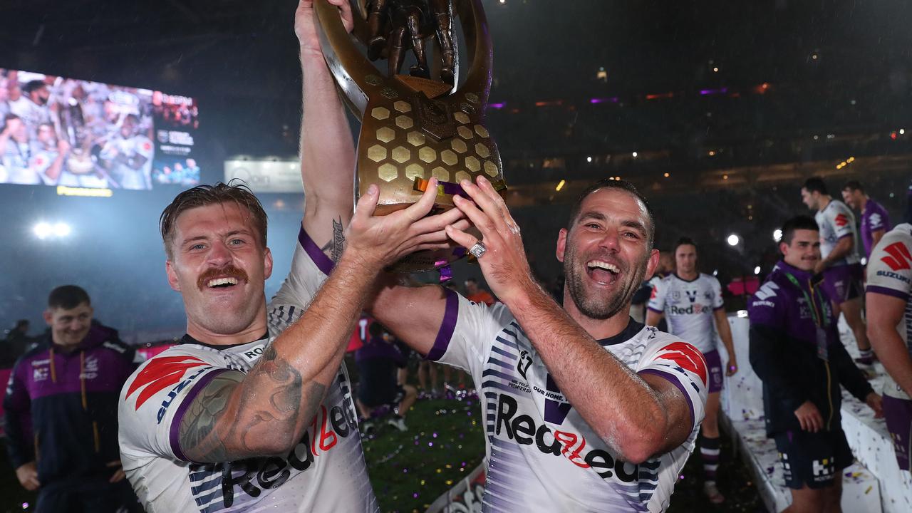 Cameron Munster and Cameron Smith celebrate the 2020 premiership. Picture: Brett Costello