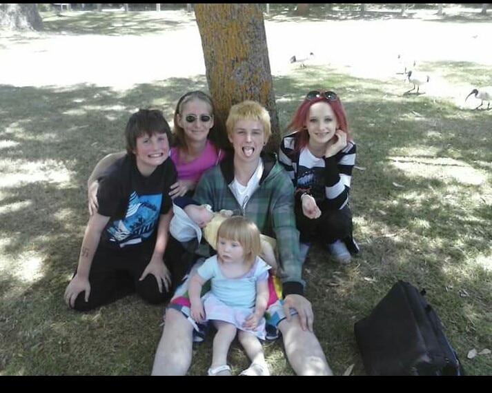 Logan woman Michelle Carroll (second from left), with children Jacob (left), Ryan, Benjamin (baby), Alice (front) and Erin (right). Picture: Contributed