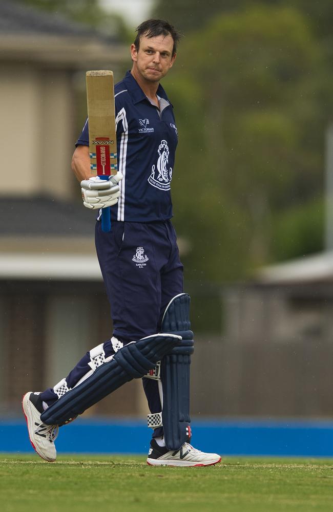 Evan Gulbis acknowledges his century. Pic: Chris Thomas, Cricket Victoria.