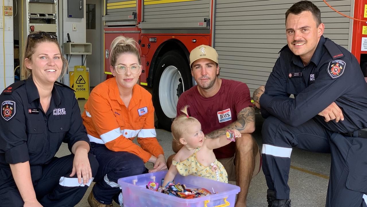 (From left to right) Sarina QFES Acting Lieutenant Shannon Gardner, Stacey Bell, one-year-old baby Ellie, Shannon Pacher and Dean Hall at the Sarina Fire Station on December 13. Picture: Duncan Evans