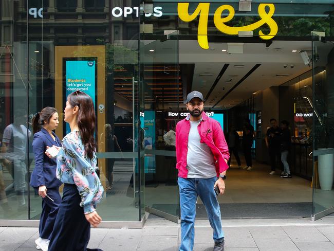 People leaving the Optus store on Wednesday morning as outage issues leave millions across Australia without service. Picture: NCA NewsWire /Gaye Gerard