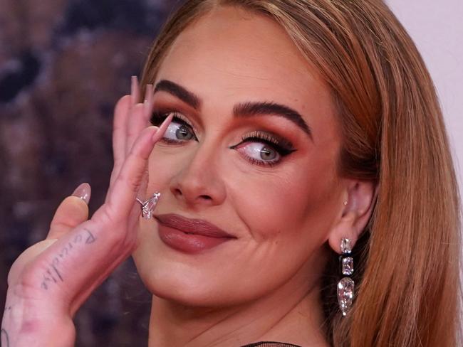 (FILES) British singer Adele Laurie Blue Adkins aka Adele poses on the red carpet upon her arrival for the BRIT Awards 2022 in London on February 8, 2022. A Brazilian judge has ordered a song by British pop superstar Adele, 