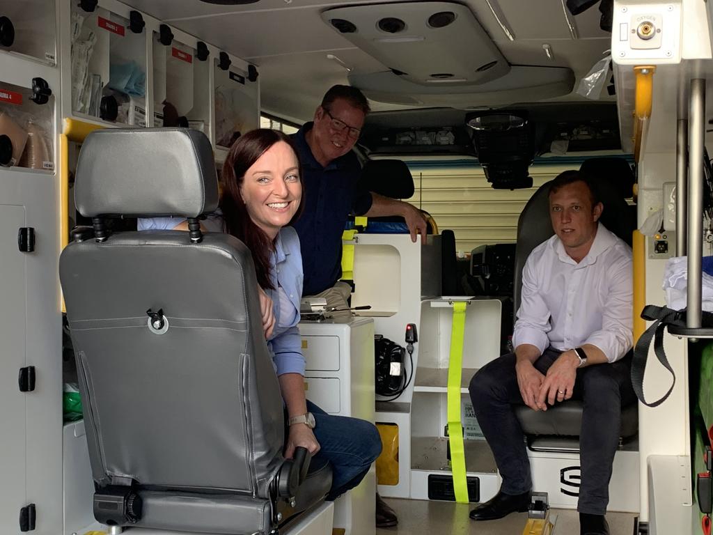 Minister for Ambulance Services Steven Miles (right) and Labor candidates for Keppel Brittany Lauga and Rockhampton Barry O'Rourke take a seat in an ambulance.