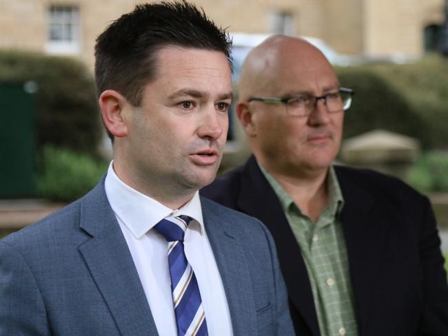 Labor's energy spokesman Dean Winter and TCCI CEO Michael Bailey speak to the media on Parliament Lawns in Hobart on Tuesday, November 7, 2023.