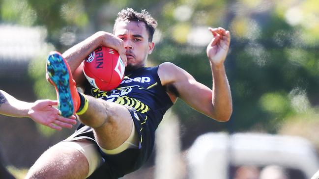 Sydney Stack pulls down a high mark at Richmond training. Picture: Michael Dodge. 