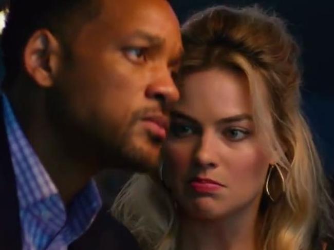 Will Smith becomes romantically involved with Margot Robbie in Focus.