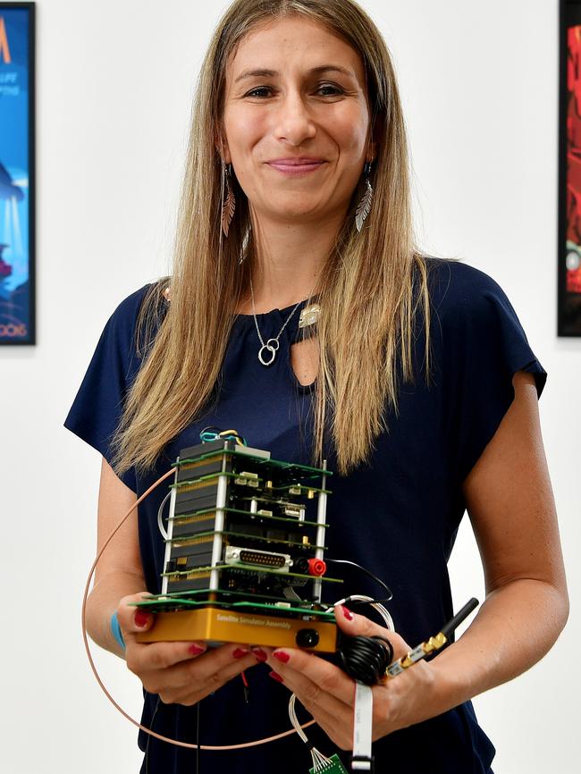 Flavia Tata Nardini holds a nanosatellite. Picture: Bianca Di Marchi