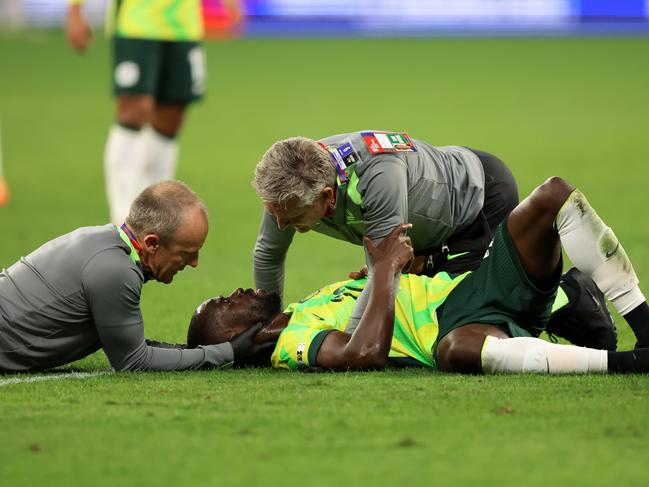 Jason Geria receives treatment after a late head clash. Picture: Getty Images
