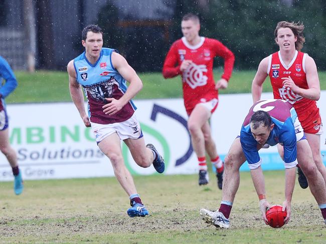 Modewarre's Brendan Wemyss (2) scoops up a loose ball. BFL: Ocean Grove v Modewarre senior football. Picture: Alan Barber