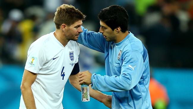 SAO PAULO, BRAZIL - JUNE 19: Steven Gerrard of England speaks to Luis Suarez of Uruguay after Uruguay's 2-1 win during the 2014 FIFA World Cup Brazil Group D match between Uruguay and England at Arena de Sao Paulo on June 19, 2014 in Sao Paulo, Brazil. (Photo by Clive Rose/Getty Images)