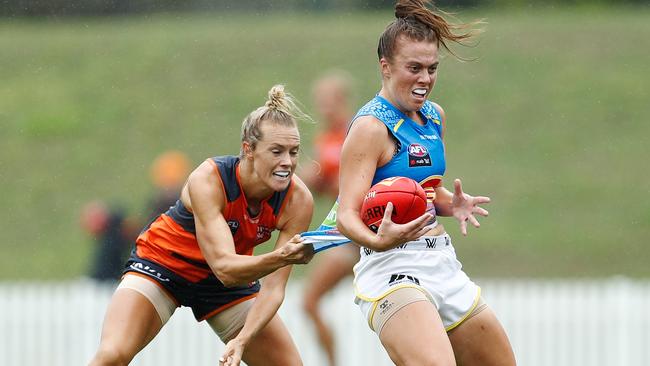 Elle Bennetts stays close to Jamie Stanton of the Suns in a match between GWS Giants and Gold Coast at Blacktown International Sportspark in February.