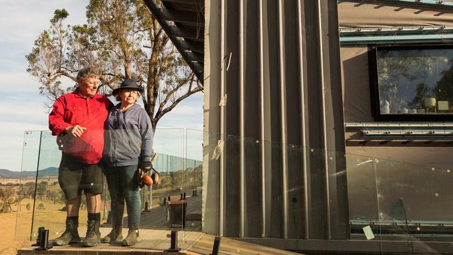 Graeme and Robyn Freedman at their property in Wandella. The Freedmans are still living in a demountable studio more than three-years after fires devastated their property on the NSW south coast. Picture Ben Marden