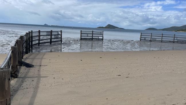 A weather event in January 2024 damaged the swimming enclosure at Dingo Beach in the Whitsundays with the council then removing pylons and mesh. Picture: Julie Houston