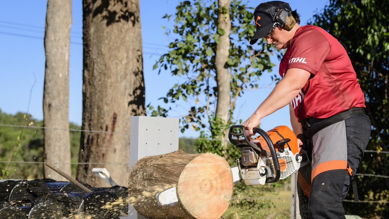 Crows Nest competitive woodchopper Jodie Beutel trains in stocksaw in preparation for the Stihl Timbersports Australian Womens Championship in South Australia next month. Picture: Kevin Farmer