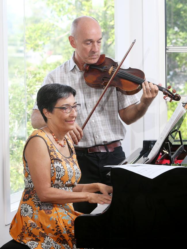 Ranjeny Thomas with husband John Loneragan at home in Brisbane’s Hawthorne. Picture: AAP/ Ric Frearson