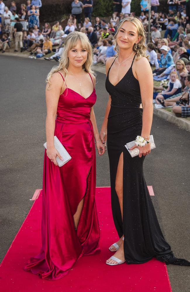 Molly Malligan (left) and Melaine Proctor at Harristown State High School formal at Highfields Cultural Centre, Friday, November 17, 2023. Picture: Kevin Farmer