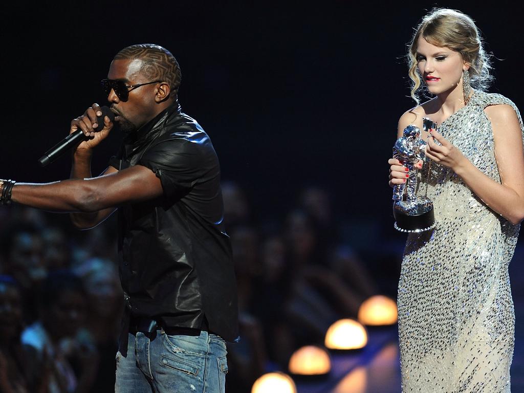 A moment in pop culture history: West yanking the microphone from Taylor Swift at the 2009 VMAs. Picture: Kevin Mazur/WireImage