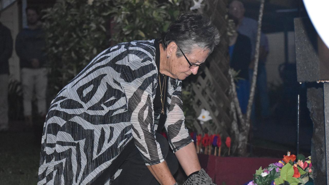 A wreath being laid at the Kuttabul dawn service at the Hampden State School Remembrance Garden 2021. Picture: Lillian Watkins