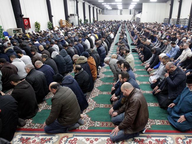 Royal ties ... People participate in prayer at the Al Khalil mosque in Molenbeek, Belgium. Source: AP