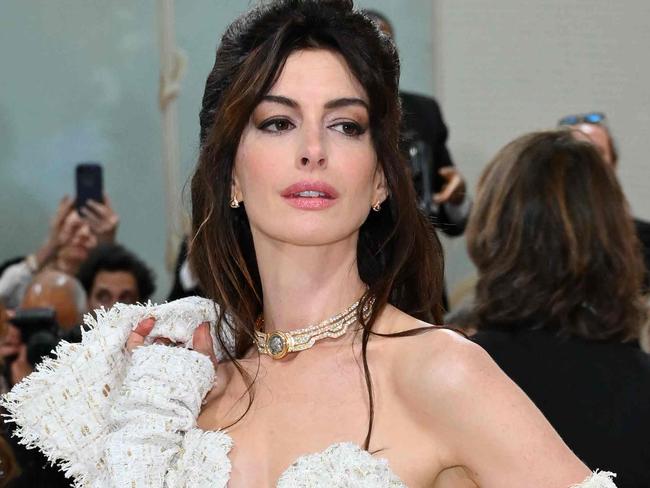 US actress Anne Hathaway arrives for the 2023 Met Gala at the Metropolitan Museum of Art on May 1, 2023, in New York. - The Gala raises money for the Metropolitan Museum of Art's Costume Institute. The Gala's 2023 theme is âKarl Lagerfeld: A Line of Beauty.â (Photo by ANGELA WEISS / AFP)