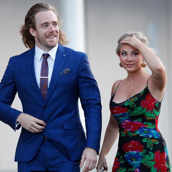 Cameron Guthrie of the Cats and partner Lauren Bumbers arrive for the event on the Gold Coast. Picture: AFL Media