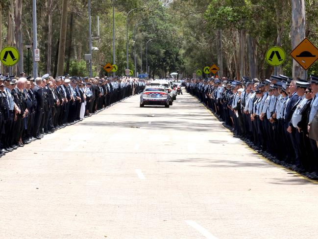 Mourners at the memorial service with full police honours for fallen constables Rachel McCrow and Matthew Arnold at Brisbane Entertainment Centre. Picture: Steve Pohlner