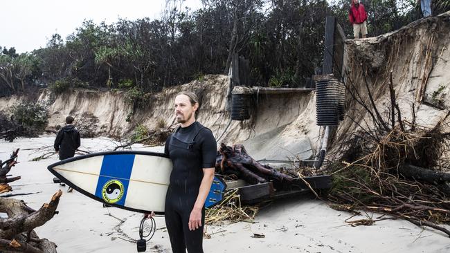 Jesse Morgan on the devastated Main Beach in Byron Bay. Picture: Natalie Grono