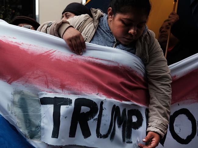 Protesters rally in front of a Trump owned hotel in Manhattan. Picture: Getty
