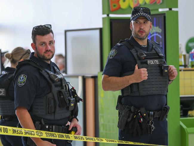 (WARNING PICTURES TAKEN INSIDE BEFORE BEING ASKED TO LEAVE BY SHOPPING CENTRE STAFF) Police guard the crime scene of  a stabbing of a  17 year boy near Boost Juice at Elizabeth City Centre Wednesday,October,23,2024.Picture Mark Brake