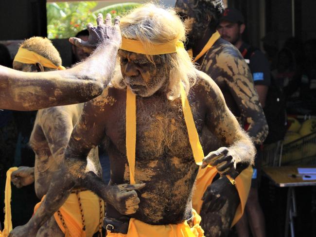 Darwin born Mak Mak Marranunggu rapper J-MILLA greets fans ahead of a concert in Wadeye on June 1, 2023.  Dancers perform a Welcome to Country. Picture: Jason Walls