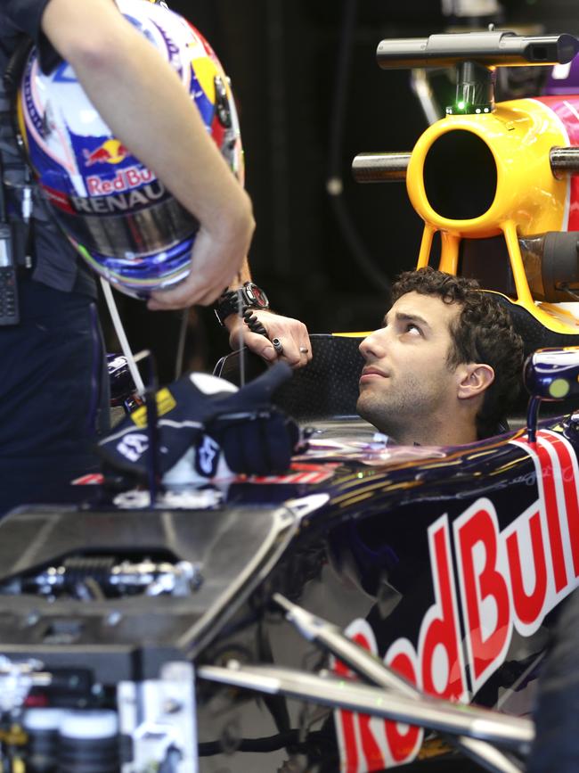 Red Bull driver Daniel Ricciardo of Australia waiting for the first practice session for the Australian Formula One Grand Prix at Albert Park. Picture: AP Photo/Rob Griffith