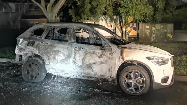 A car was left burnt out after the fake pizza delivery. Picture: NSW Police