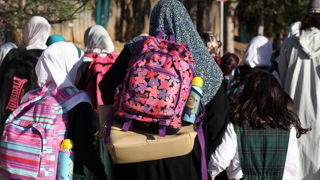 Students leaving the Malek Fahd Islamic school in Greenacre. The Sydney school will be audited on Wednesday. Picture: Jonathan Ng