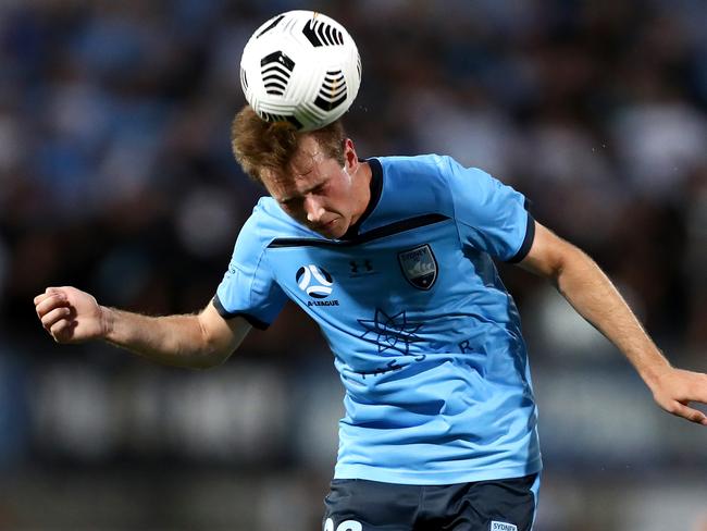 SYDNEY, AUSTRALIA - FEBRUARY 20: Calem Nieuwenhof of Sydney heads the ball during the A-League match between Sydney FC and the Brisbane Roar at Netstrata Jubilee Stadium, on February 20, 2021, in Sydney, Australia. (Photo by Brendon Thorne/Getty Images)