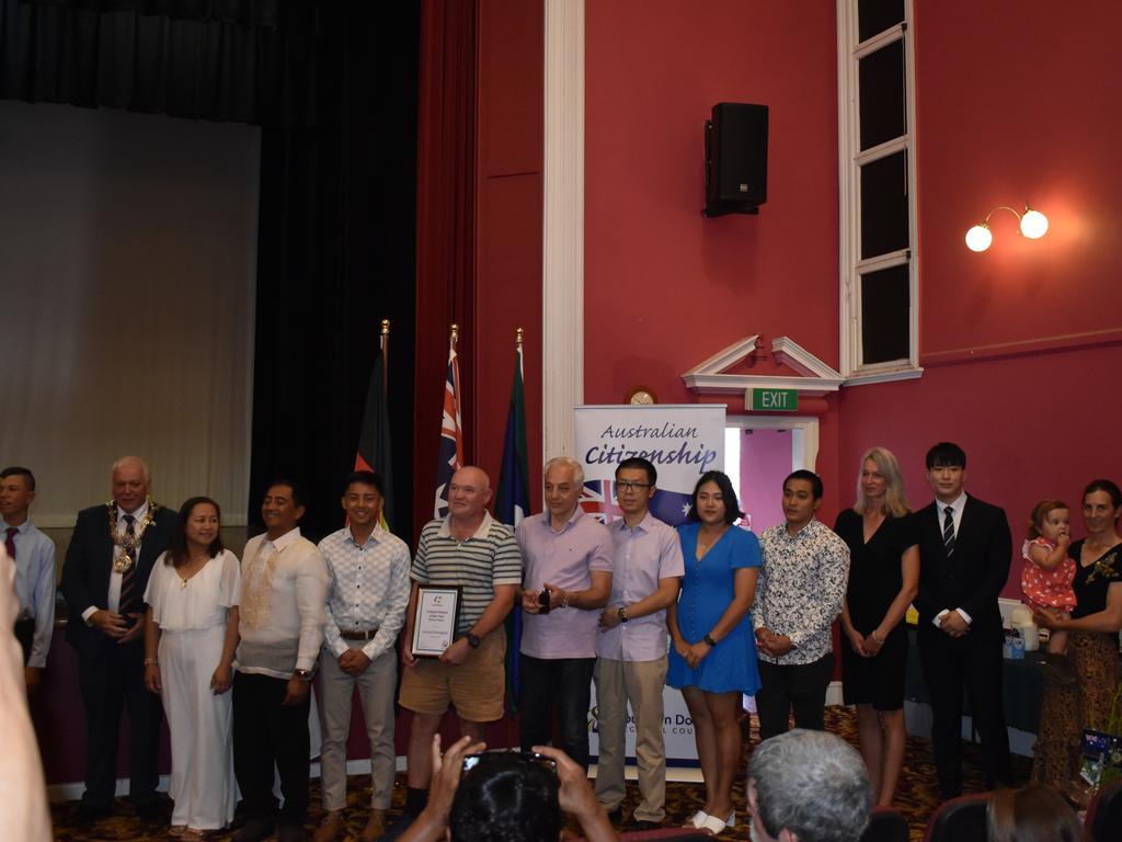 New Australian citizens join Mayor Vic Pennisi after accepting their citizenship (Photo: Warwick Daily News)