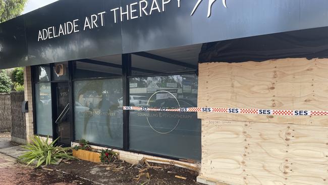 The boarded up walls of Adelaide Art Therapy in Blackwood. Picture: Ben Brennan