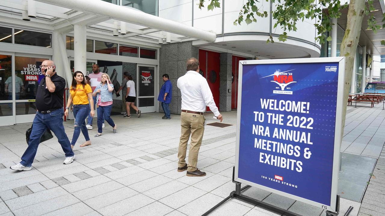 70,000 people walk past the entrance of the National Rifle Association Annual Meeting in Houston. Picture: AFP