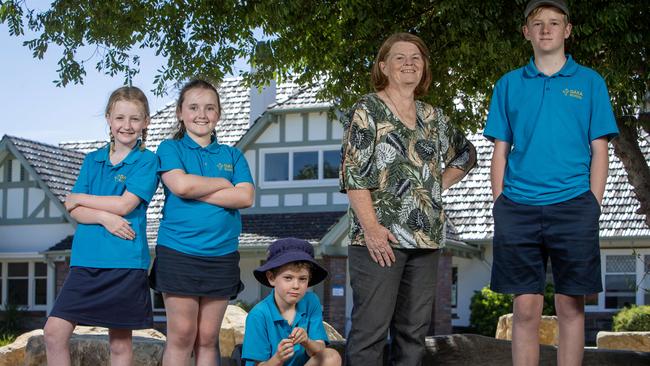 Dara School principal Dr Lynda McInnes with students (from left) Molly, 9, Aoife, 9, Thomas, 9 and Ellis, 12. Picture: Emma Brasier