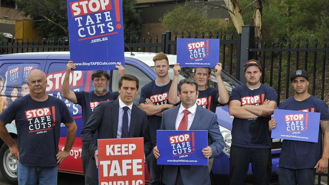 Phil Chadwick (at rear left) outside Cambelltown TAFE in 2015, with students protesting impending cuts. Picture: Timothy Clapin