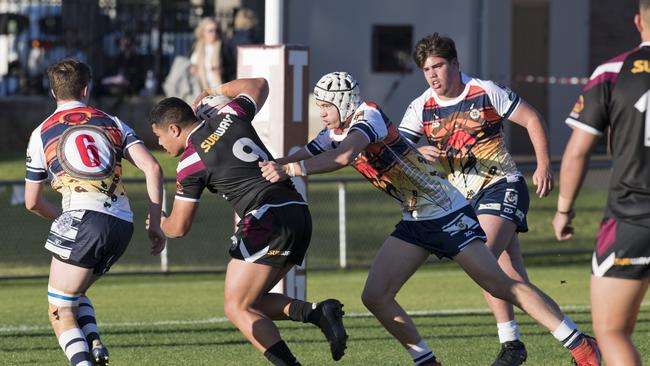 Chris Faagutu, Marsden tackled by Thomas McGahn, St Mary's. St Mary's College vs Marsden State High School in the Langer Cup. Wednesday, 29th Jul, 2020.