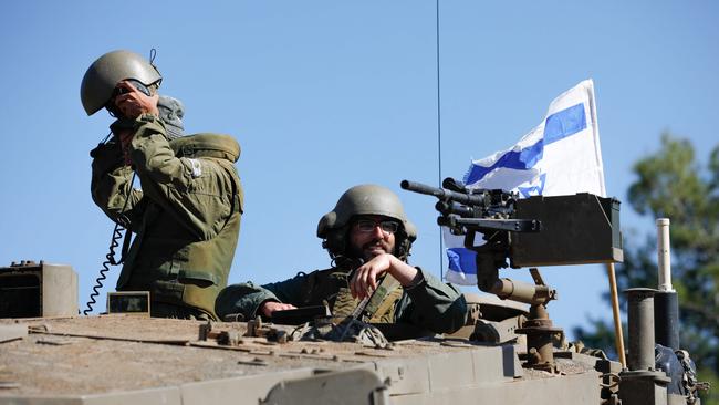 Israel has massed tens of thousands of troops and hundreds of tanks along the Gaza border. Picture: Jalaa Marey/AFP/Ho/Khamenei.ir