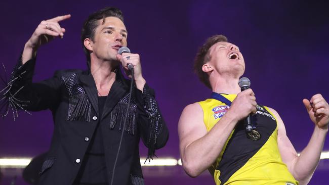 The Killers’ lead singer Brandon Flowers supports Jack Riewoldt in <i>Mr Brightside</i>. Picture: Alex Coppel.