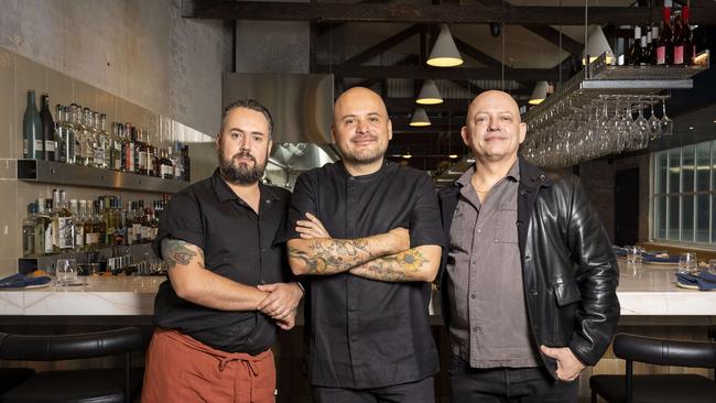 Former head chef Alejandro Huerto (centre) and owner Walter Shellshear (right) with Kieran Took (left) at Comedor when it opened earlier this year. Picture: Tom Parrish