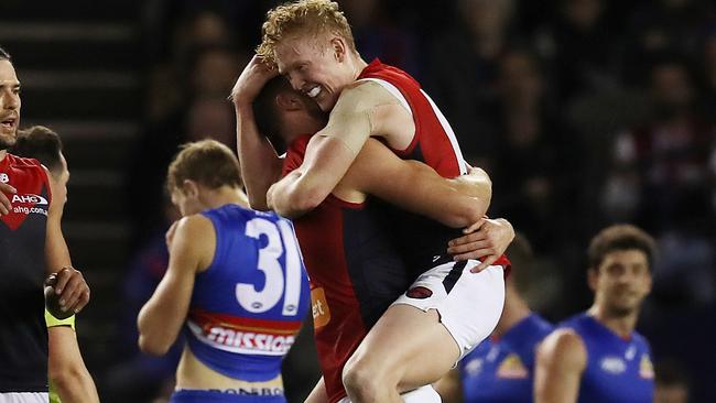 Clayton Oliver and Jack Watts celebrate during their big win over the Bulldogs. Picture: Michael Klein